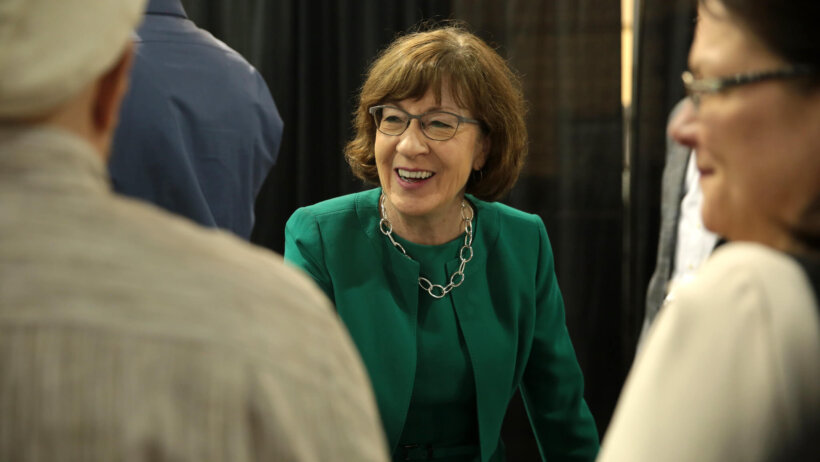 Susan Collins meeting with voters.