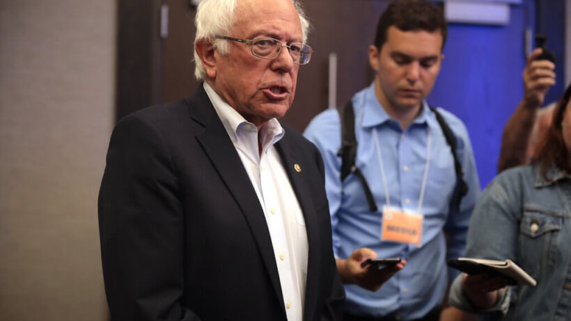 Bernie Sanders speaking to reporters