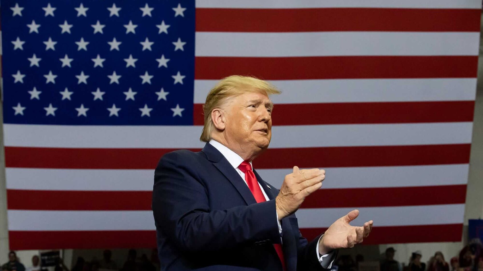 Donald Trump clapping at a rally