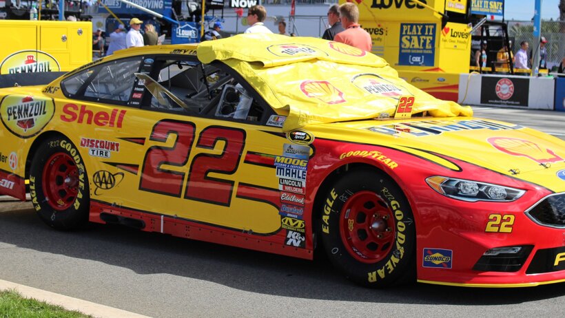 Joey Logano's car with a cover on it.