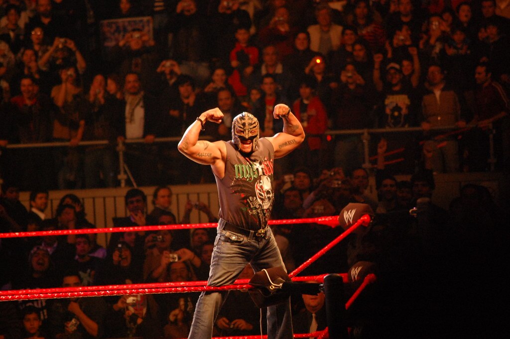 Rey Mysterio flexing
