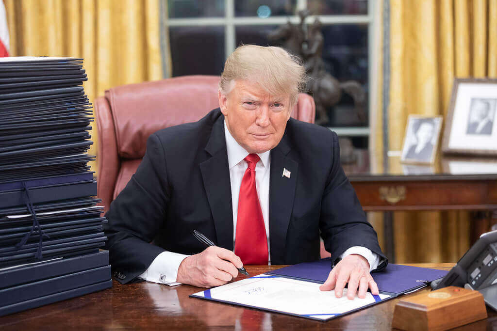 Trump signing documents