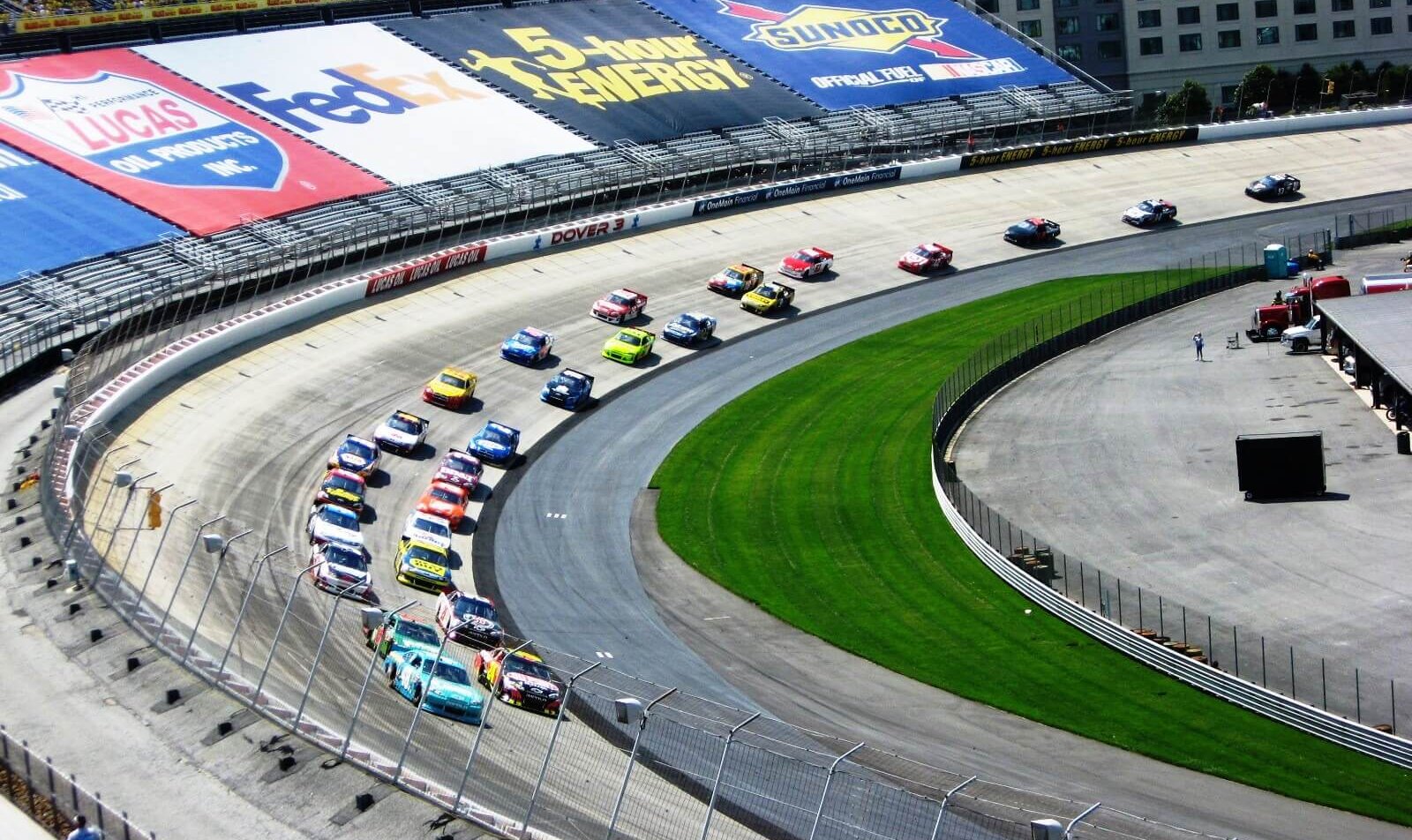 Drivers making the final turn at Dover.