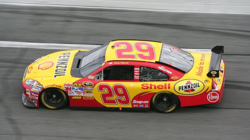 Kevin Harvick speeding around a turn.