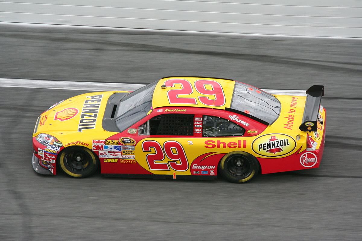 Kevin Harvick speeding around a turn.