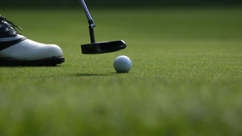 putter golf ball shoes green