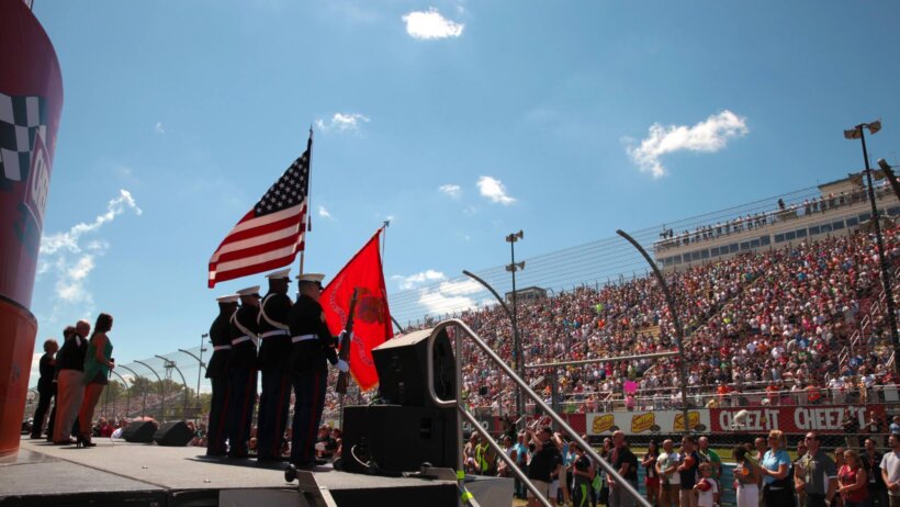 American flags fly at a NASCAR race