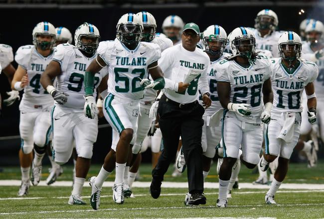 Tulane Green Wave running onto the field